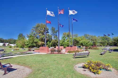 benches, flags, and open spaces in Ocean Pines Memorial Park